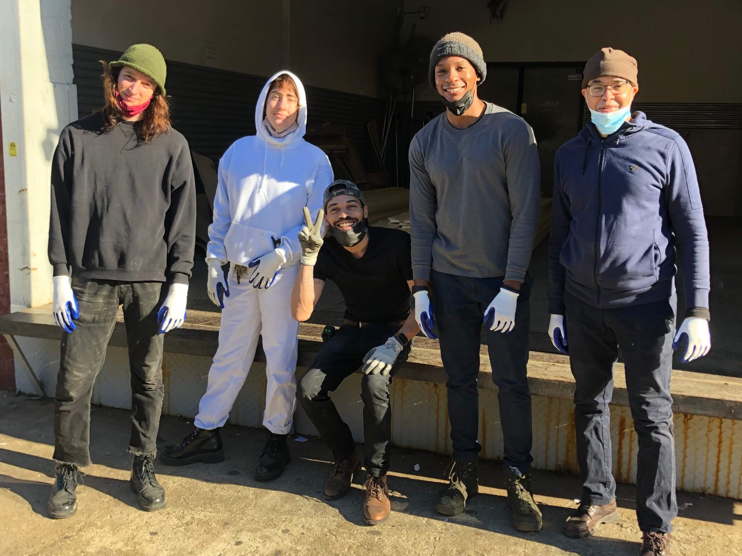 Members of the team at Brooklyn Woods who are building native bee houses for The Bee Conservancy.